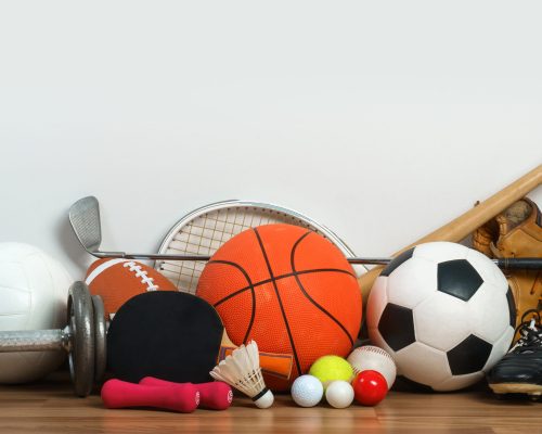 Sports Equipment on wooden background Sports Equipment on wooden background